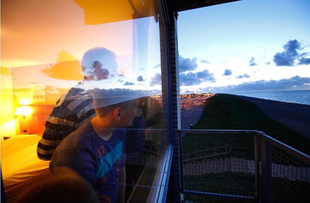 Deluxe tweepersoonskamer met balkon en uitzicht op zee